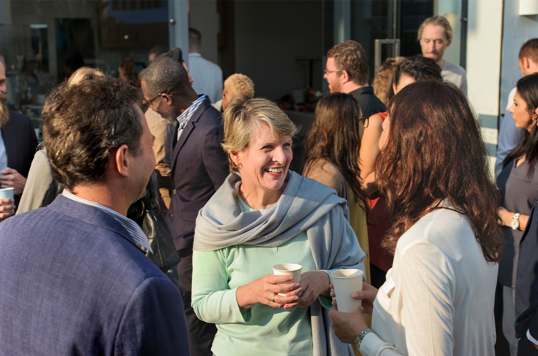 Group of people networking at an event